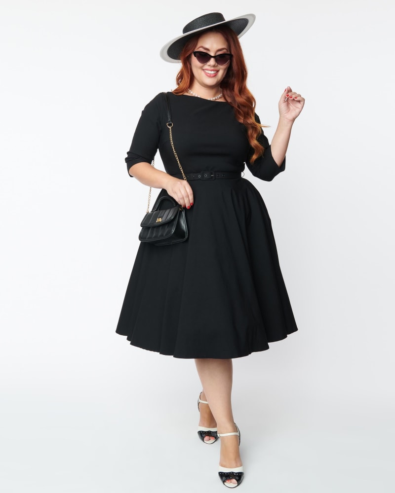 Front of a model wearing a size 1X/16 Unique Vintage Plus Size 1950s Black Devon Swing Dress in Black by Unique Vintage. | dia_product_style_image_id:270033